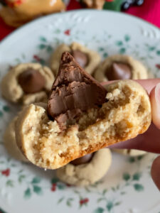 These Almond Butter Thumbprint Cookies are an almondy version of the classic peanut butter blossom cookies. They are made with some healthier ingredients, making them a great addition to your Christmas cookie lineup!